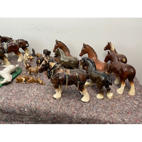 100 - Large collection of porcelain horses / Shire ornaments - some A/F