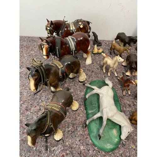 100 - Large collection of porcelain horses / Shire ornaments - some A/F