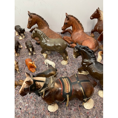 100 - Large collection of porcelain horses / Shire ornaments - some A/F