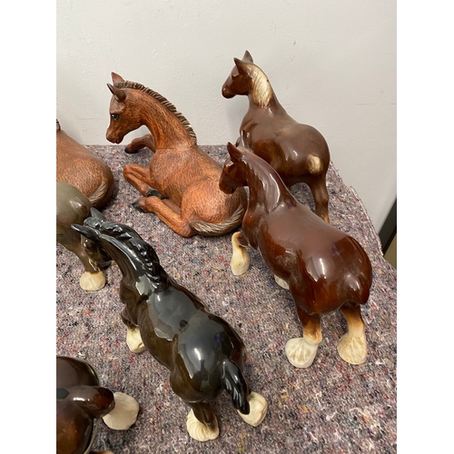 100 - Large collection of porcelain horses / Shire ornaments - some A/F