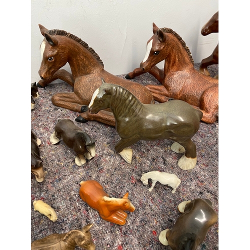 100 - Large collection of porcelain horses / Shire ornaments - some A/F