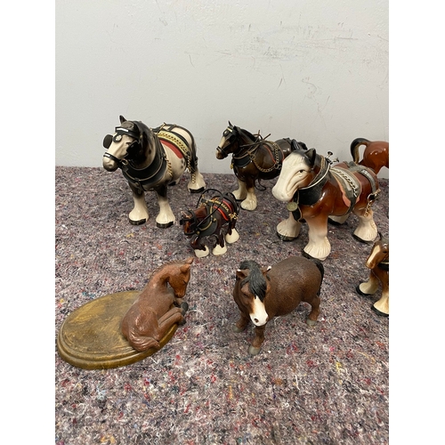 102 - Collection of porcelain horse / shire ornaments