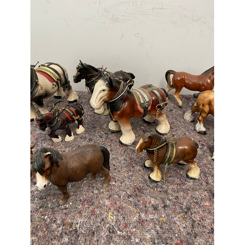 102 - Collection of porcelain horse / shire ornaments