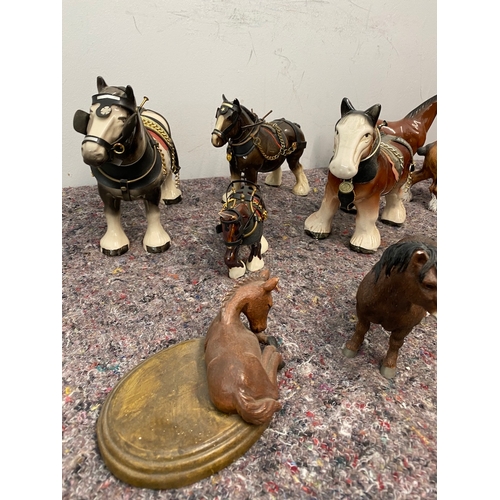 102 - Collection of porcelain horse / shire ornaments