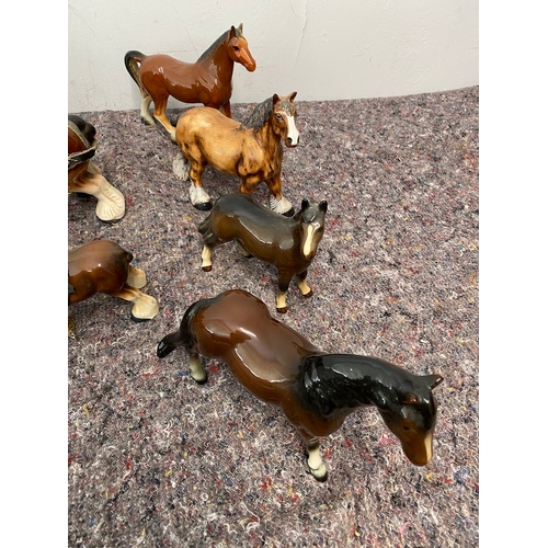 102 - Collection of porcelain horse / shire ornaments