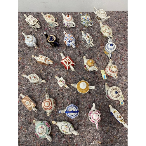 106 - Collection of 26 Porcelain Art Miniature Tea pots with tags all in very good order