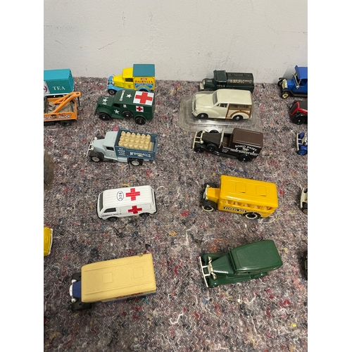 86 - Collection of boxed and loose vintage advertisement vans / trucks