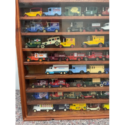 87 - Large framed glass wall display with various vintage commercial advertisement vehicles Days Gone + o... 