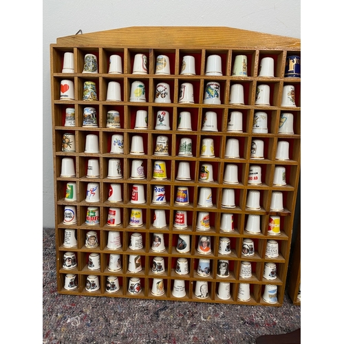 94 - Collection of 5 framed collectable / advertisement thimbles approx 250/300