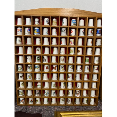 94 - Collection of 5 framed collectable / advertisement thimbles approx 250/300