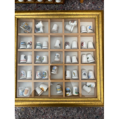 94 - Collection of 5 framed collectable / advertisement thimbles approx 250/300