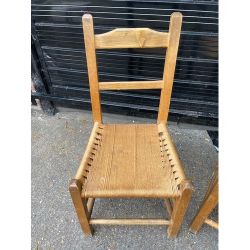 300 - A Pair of Mid century Rush Seated Dining Chairs
92cm x 46cm x 42cm