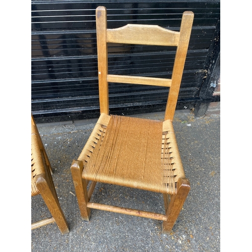 300 - A Pair of Mid century Rush Seated Dining Chairs
92cm x 46cm x 42cm