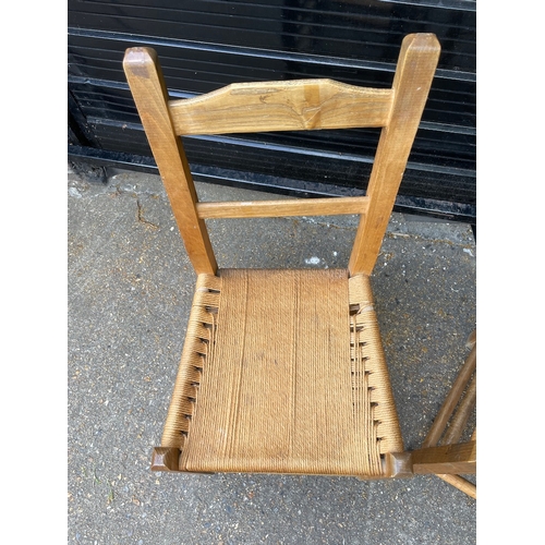 300 - A Pair of Mid century Rush Seated Dining Chairs
92cm x 46cm x 42cm