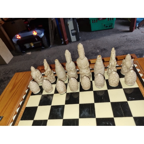 227 - Vintage Pine Chess Table with chess / draughts pieces, 3 section need to be reglued.