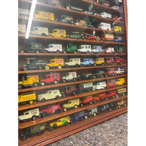 35 - Vintage Mahogany Glazed Collectable Wall Display case with a collection of Yesteryear Cars 63cm x 66... 