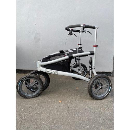 132 - Trionic Veloped Tour Walker in excellent condition comes with pump and lock - 14 inch wheels need pu... 