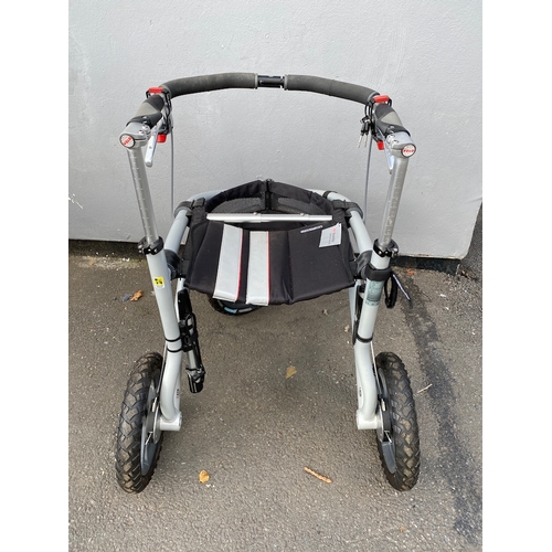 132 - Trionic Veloped Tour Walker in excellent condition comes with pump and lock - 14 inch wheels need pu... 