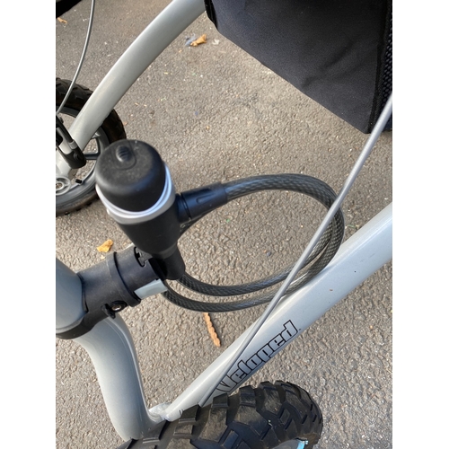 132 - Trionic Veloped Tour Walker in excellent condition comes with pump and lock - 14 inch wheels need pu... 