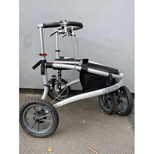 132 - Trionic Veloped Tour Walker in excellent condition comes with pump and lock - 14 inch wheels need pu... 