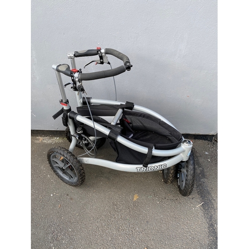 132 - Trionic Veloped Tour Walker in excellent condition comes with pump and lock - 14 inch wheels need pu... 