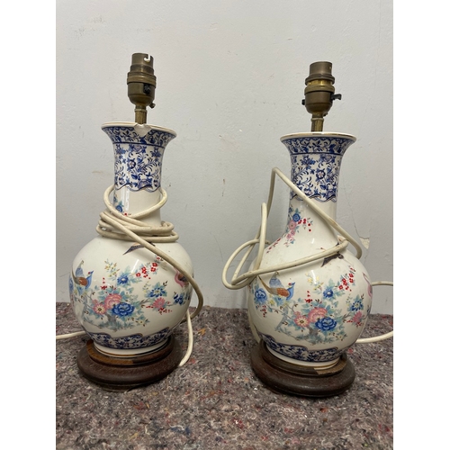 6 - Pair of vintage oriental vase lamps - 1 has chip to lip as shown, 1 has damage to wooden base approx... 