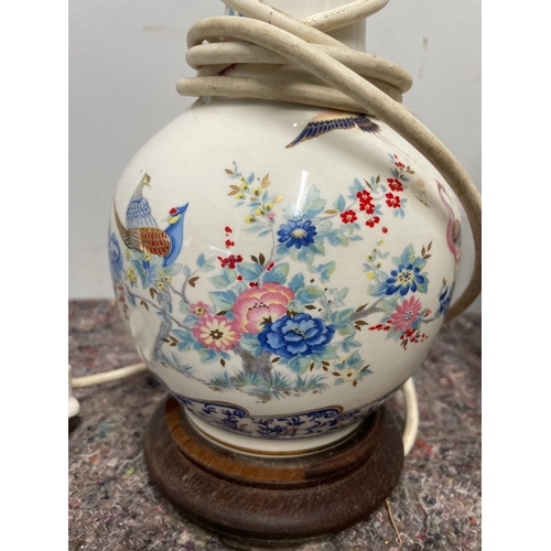 6 - Pair of vintage oriental vase lamps - 1 has chip to lip as shown, 1 has damage to wooden base approx... 