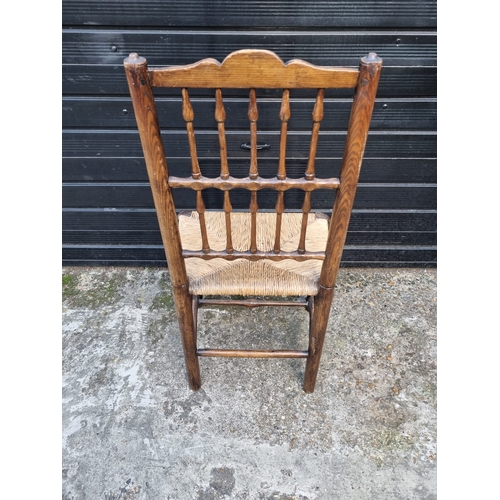 355 - 19th Century Oak Spindle Back Chair with Rush Seat on pad feet