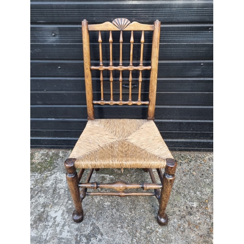 355 - 19th Century Oak Spindle Back Chair with Rush Seat on pad feet