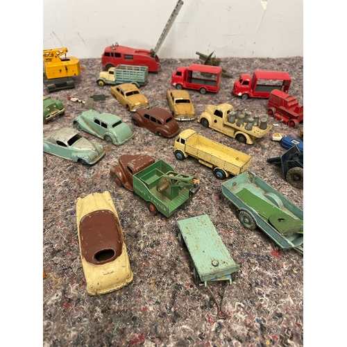 29 - Collection of various played with metal Dinky Toy cars / Commercial vehicles plus others - A/F