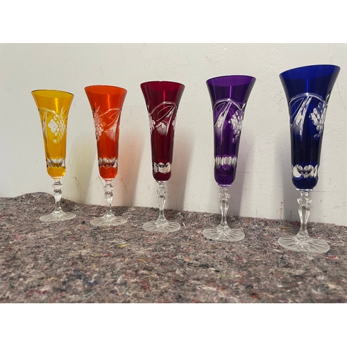 33 - 5 vintage coloured cut glass champagne flutes - some have very slight knick to rim