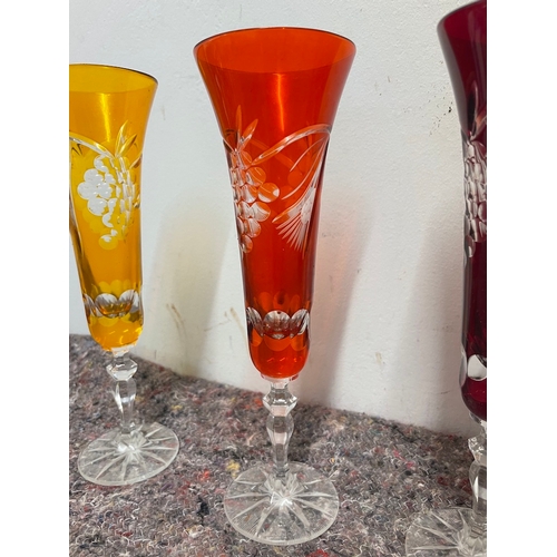 33 - 5 vintage coloured cut glass champagne flutes - some have very slight knick to rim