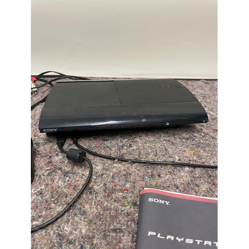 119 - Playstation 3 Slim with Dual shock controllers + cables etc - powers up not fully tested