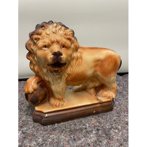 135 - 19th Century Staffordshire Lion and ball  + 1 the late 20th century lion - crazing present on both