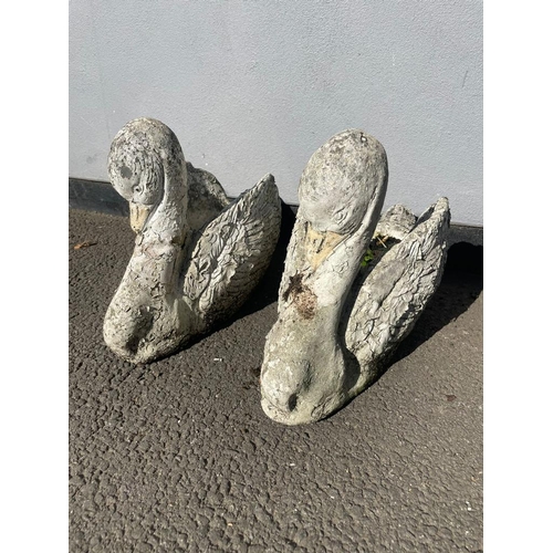 381 - Two weather stone garden planters in shape of swans