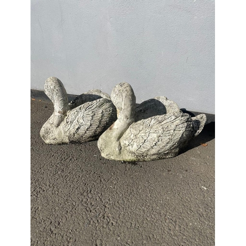 381 - Two weather stone garden planters in shape of swans