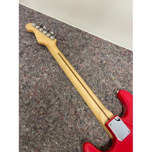 183 - Red Squier Stratocaster by Fender Red Electric Guitar - in good order , small chip shown