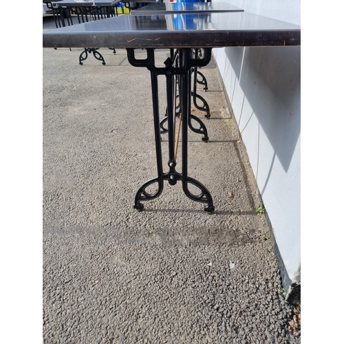 235 - A Pair Cafe / Bistro Tables - iron legs - no screws to fix