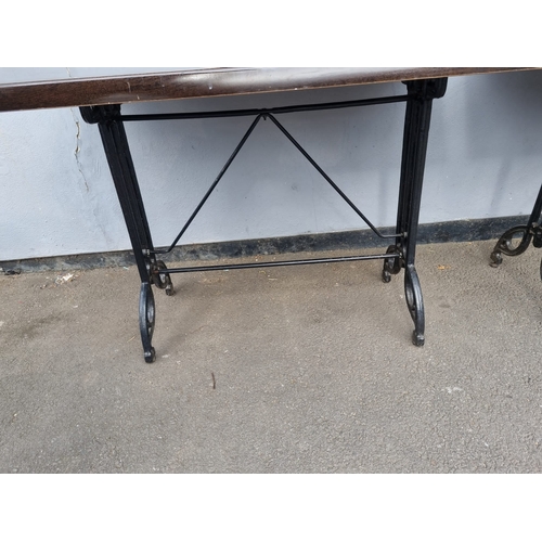 236 - A Pair Cafe / Bistro Tables - iron legs - no screws to fix