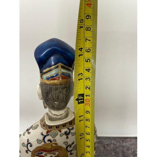 77 - Early 20th century oriental polychrome hand painted  ceramic figure of emperor - A/F - 37CM X