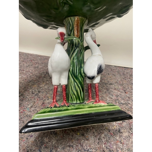 103 - 20th century porcelain raise bowl on a trio of birds - all in good order bowl looks to have been reg... 