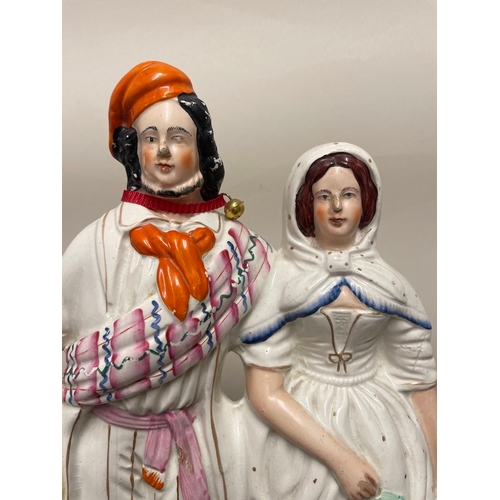 104 - 19th century Staffordshire porcelain figure of couple - hair line mark, chips to base as shown - 40c... 