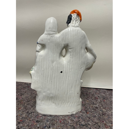 104 - 19th century Staffordshire porcelain figure of couple - hair line mark, chips to base as shown - 40c... 