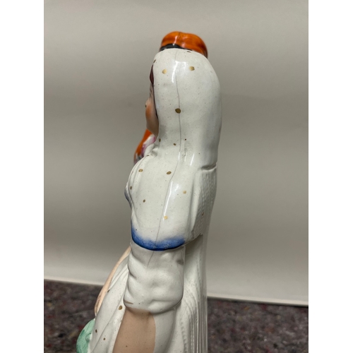 104 - 19th century Staffordshire porcelain figure of couple - hair line mark, chips to base as shown - 40c... 