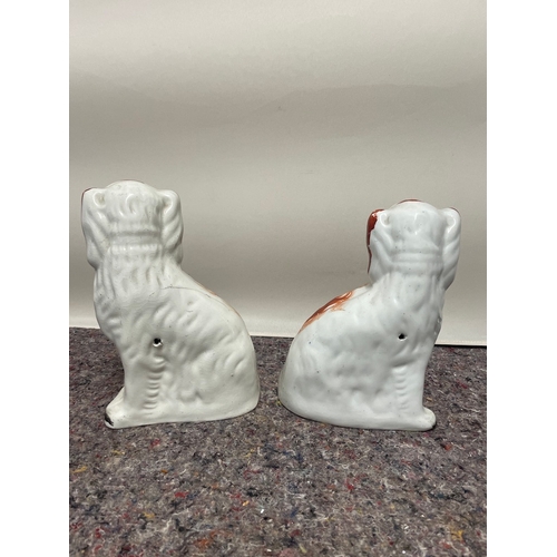 105 - Pair of 19th century Staffordshire dogs - hair line fracture plus crazing - 23cm