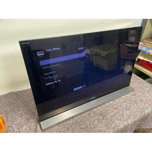 129 - Working Sony TV with Remote and Sony TV stand