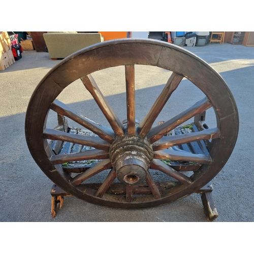 157 - Antique Cartwheel Garden Bench - The wheel is in very good order and no rot, bench needs a lot of at... 