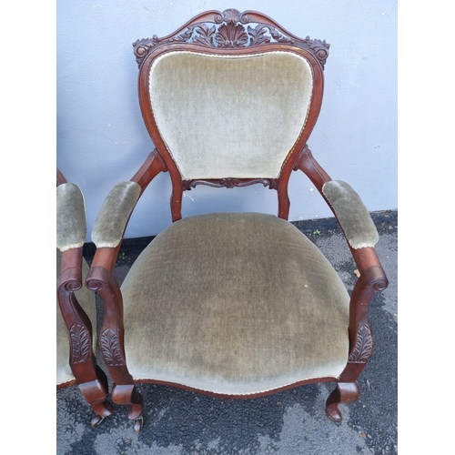 176 - 19th century pair of upholstered and mahogany framed armchairs