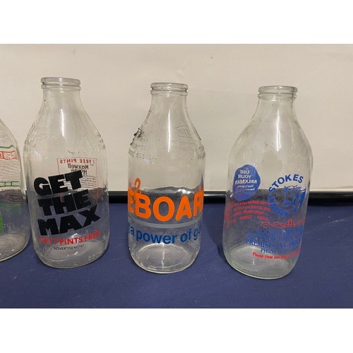 21 - Collection of vintage branded milk bottles
