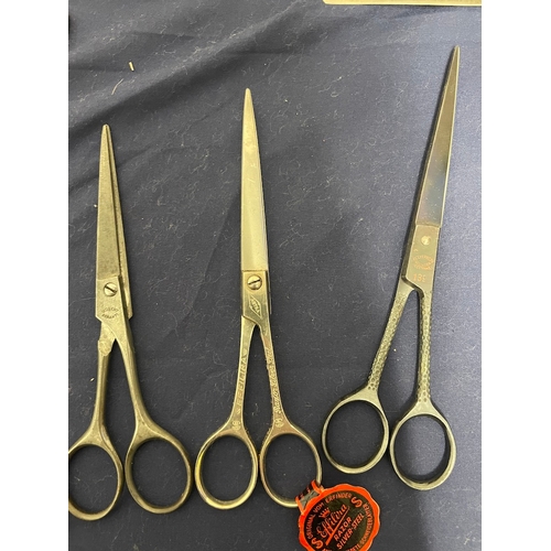 67 - Collection of vintage barber scissors + others